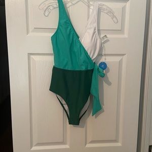 Faux wrap bathing suit in green and white